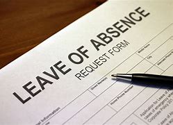 Leave of absence request form with a pen placed on it.