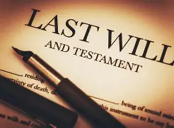 Close-up of a last will and testament document with pen, symbolising legal affairs.