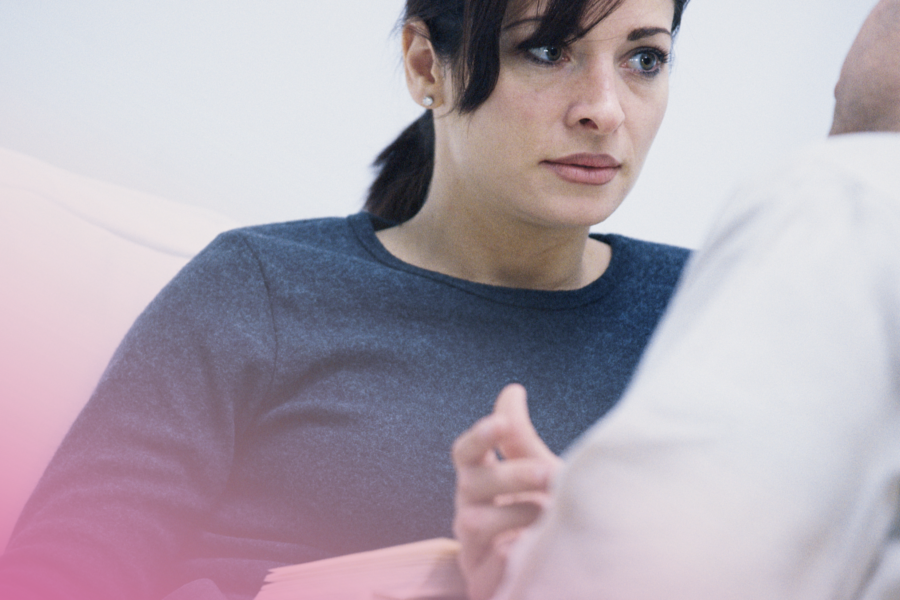 Woman attentively listening during a conversation.
