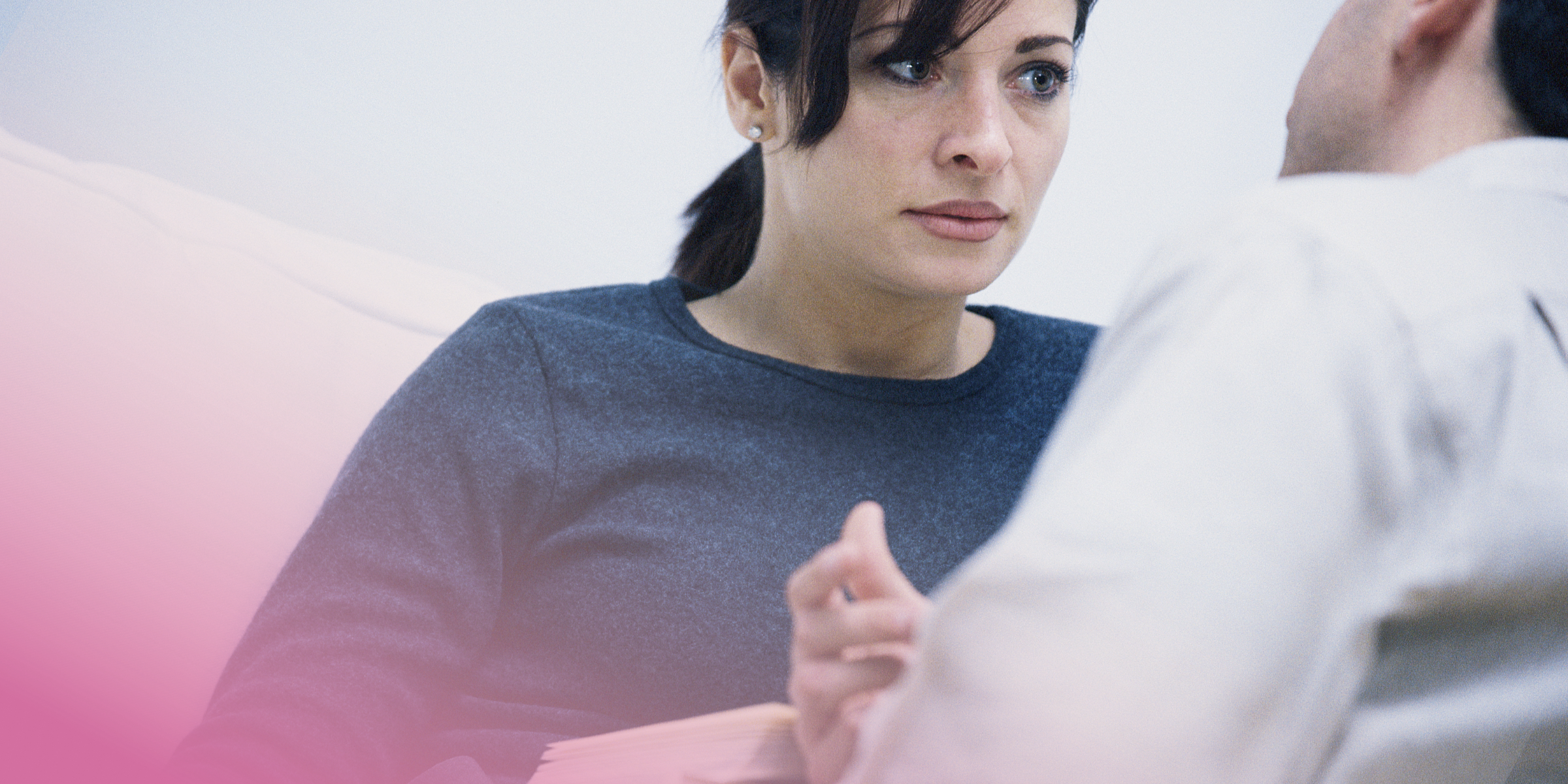 Woman attentively listening during a conversation.